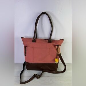 R. Riveter Otto tote handbag features a pink canvas exterior with brown leather